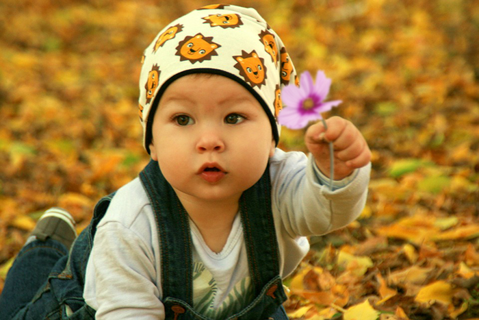 Female baby twin with flower